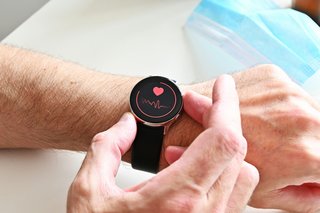 Someone using a smart watch.